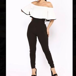 Elegant jumpsuit with ruffled shoulder design BRAND NEW